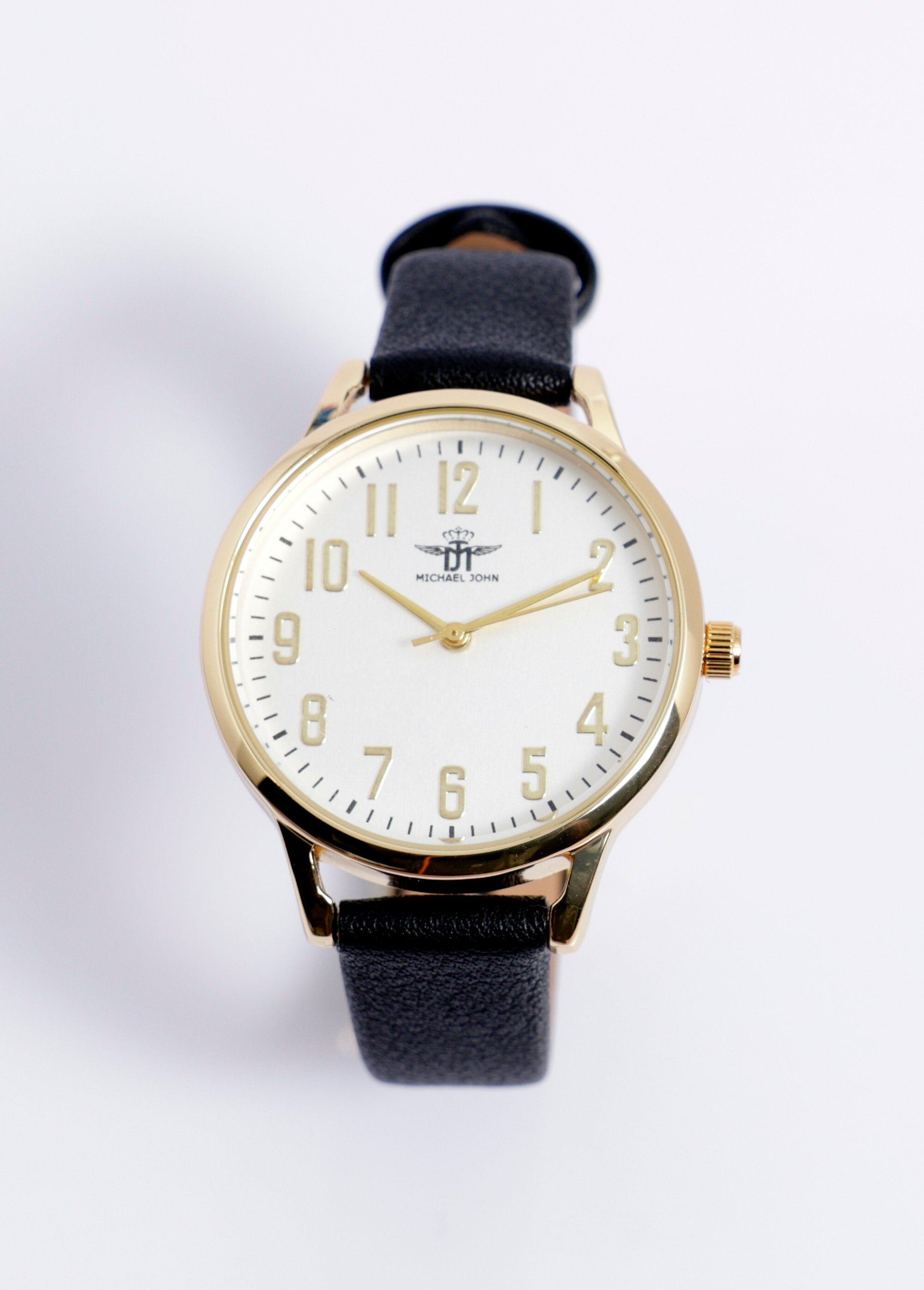 Round_metal_watch_with_faux_leather_strap_Black_gold_FA1_slim