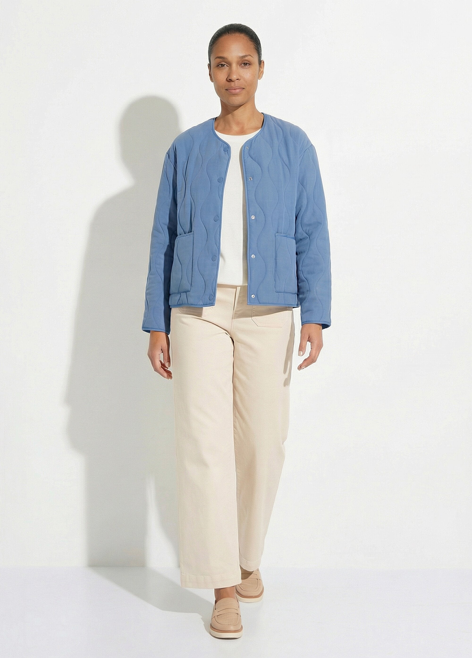 Collarless_zip-up_quilted_jacket_Blue_SF1_slim